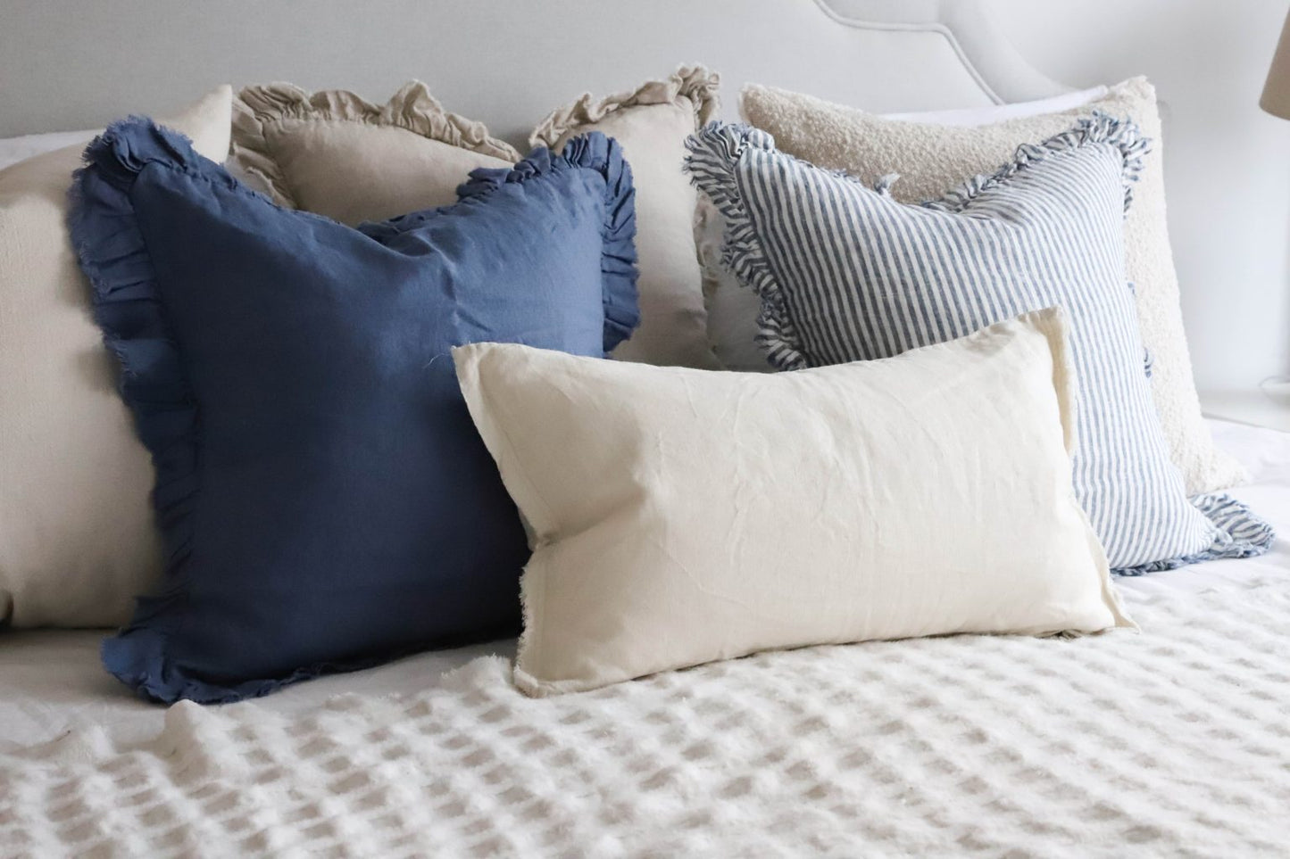 Hallie Navy Stripe Ruffle Cushion